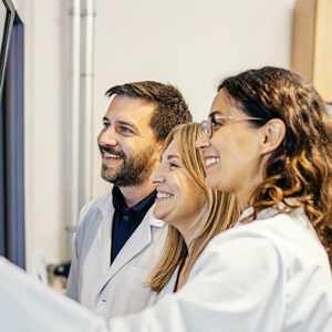 Doctors looking at screen